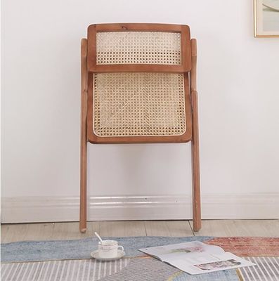 Sedia da pranzo in rotano pieghevole in legno massello nordico con artigianato tradizionale