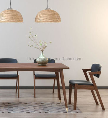 Poltrona da pranzo in pelle in PU commerciale in legno per caffetteria d'albergo versatile e funzionale