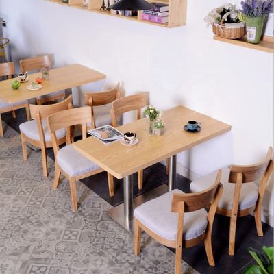 Tavola da pranzo e sedie rotonde in legno massello per il latte Negoziazione negozio di tè Caffè Ristorante occidentale Fast Food Snack Bar