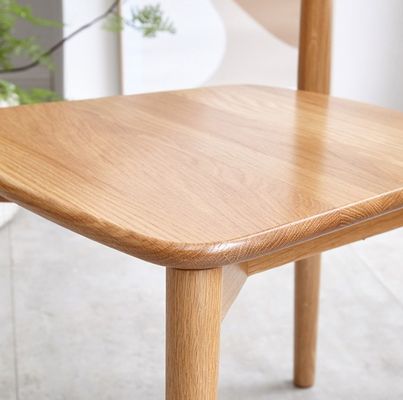 Poltrona da pranzo impilabile per ristorante moderno in legno massello in colore naturale