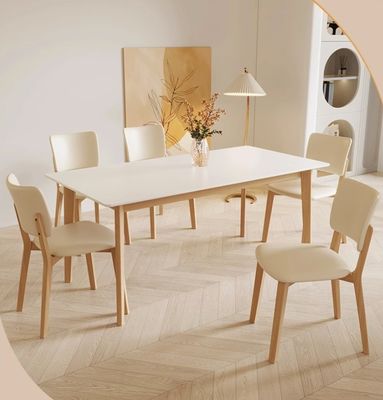 Moderno design nordico Tavolo da pranzo in legno massello con sedie in pelle in PU nero/bianco e stile nordico