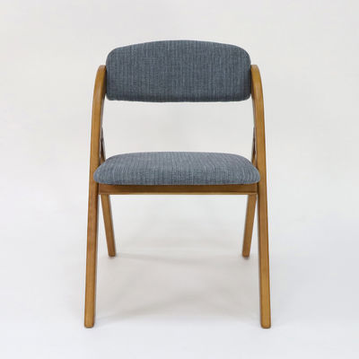 Sedia da pranzo in legno in stile vintage con design pieghevole e copertura in tessuto